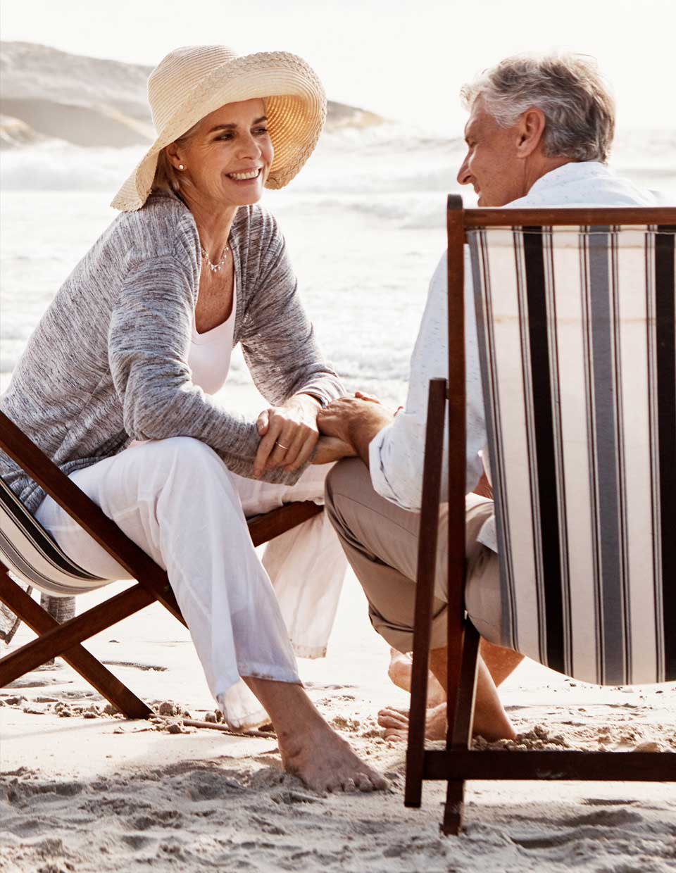 promo image for retired couple at beach house